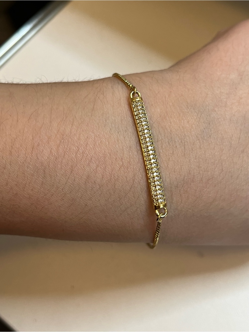 Adjustable gold tone rhinestone bar bracelet